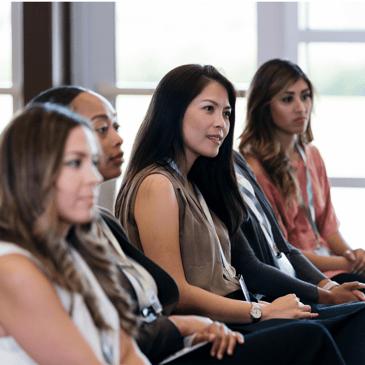 Nursing conference attendees listening to a speaker